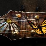 Monarch butterfly and flower headstock